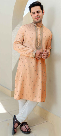 Orange color Kurta Pyjamas in Poly Silk, Viscose fabric with Embroidered work