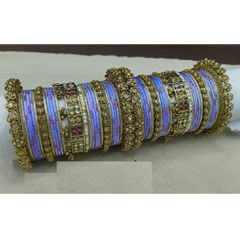 Gold Rodium Polish Blue color Bangles in Metal Alloy studded with CZ Diamond