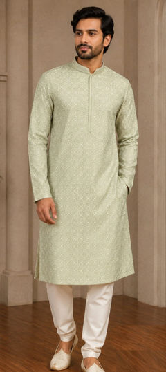 Green color Kurta Pyjamas in Art Silk fabric with Embroidered work