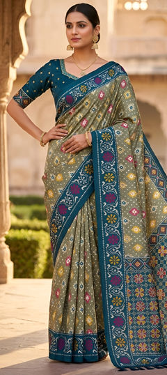 Green color Saree in Patola Silk fabric with Weaving work
