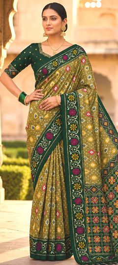 Green color Saree in Patola Silk fabric with Weaving work