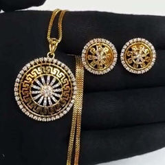 Gold Rodium Polish Gold color Pendant in Brass studded with Austrian diamond