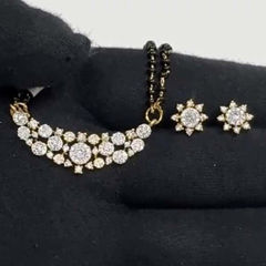 Gold Rodium Polish White and Off White color Pendant in Brass studded with Austrian diamond