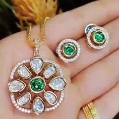 Gold Rodium Polish Green color Pendant in Brass studded with Austrian diamond