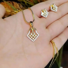 Gold Rodium Polish White and Off White color Pendant in Brass studded with Austrian diamond