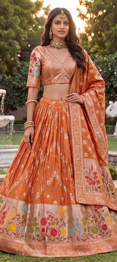 Orange color Lehenga in Tussar Silk fabric with Weaving work