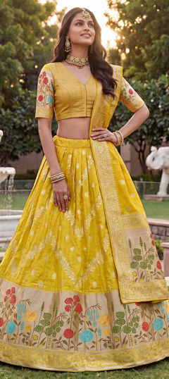 Yellow color Lehenga in Tussar Silk fabric with Weaving work