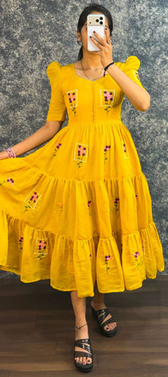 Yellow color Gown in Mul Cotton fabric with Embroidered work