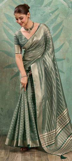 Green color Saree in Tissue fabric with Weaving work
