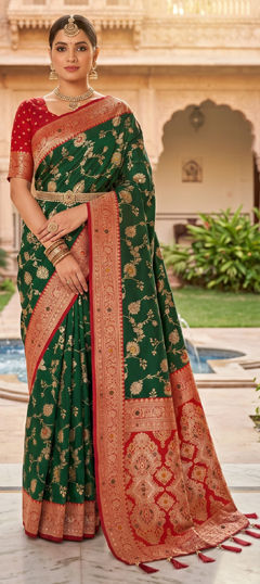 Green color Saree in Banarasi Silk fabric with Weaving work