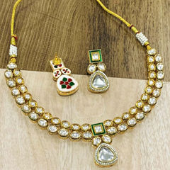 Gold Rodium Polish Green color Necklace in Brass studded with Kundan