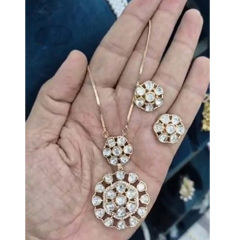 Gold Rodium Polish White and Off White color Pendant in Brass studded with Kundan