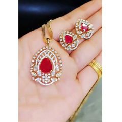 Gold Rodium Polish Red and Maroon color Pendant in Brass studded with Austrian diamond