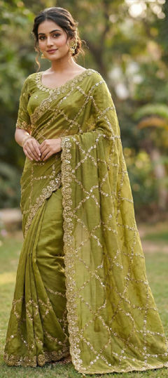 Green color Saree in Tissue fabric with Bugle Beads work