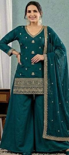 Green color Salwar Kameez in Roman Silk fabric with Embroidered work