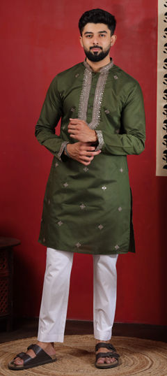 Green color Kurta Pyjamas in Cotton fabric with Embroidered work