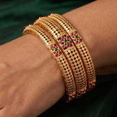 Gold Rodium Polish Green color Bangles in Brass studded with CZ Diamond