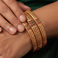 Gold Rodium Polish Green color Bangles in Brass studded with CZ Diamond
