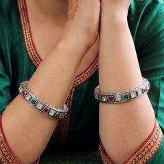 Gold Rodium Polish Green color Bangles in Brass studded with CZ Diamond