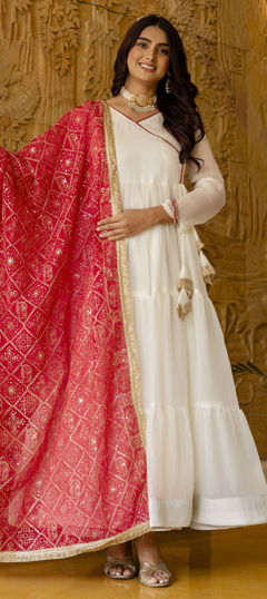 Red and Maroon, White and Off White color Gown in Viscose fabric with Lace work