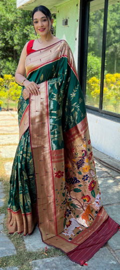 Green color Saree in Silk fabric with Weaving work