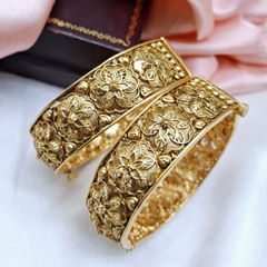 Gold Rodium Polish Gold color Bangles in Metal Alloy studded with Artificial
