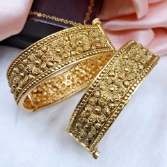 Gold Rodium Polish Gold color Bangles in Metal Alloy studded with Artificial