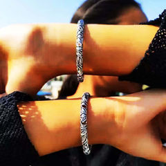 Silver Rodium Polish Silver color Bangles in Brass studded with Artificial
