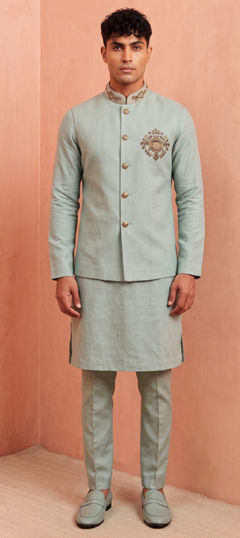 Green color Kurta Pyjama with Jacket in Linen fabric with Bugle Beads, Cut Dana, Patch work