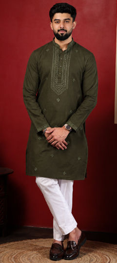 Green color Kurta Pyjamas in Cotton fabric with Embroidered work