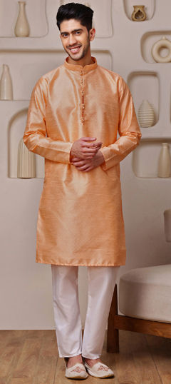 Orange color Kurta Pyjamas in Blended fabric with Weaving work