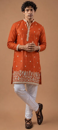 Orange color Kurta Pyjamas in Viscose fabric with Embroidered work