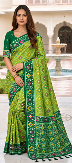Green color Saree in Patola Silk fabric with Weaving, Zari work