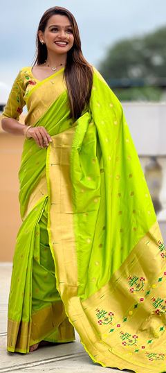 Green color Saree in Patola Silk fabric with Weaving, Zari work
