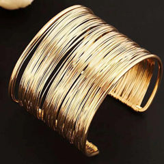 Gold Rodium Polish Gold color Bangles in Brass studded with Artificial