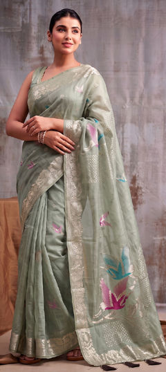 Green color Saree in Linen fabric with Weaving work
