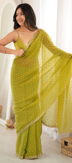 Green color Saree in Faux Chiffon fabric with Embroidered, Weaving work