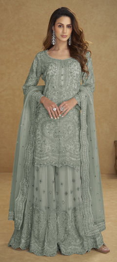 Green color Salwar Kameez in Net fabric with Embroidered, Stone work