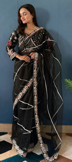 Black and Grey color Saree in Net fabric with Sequence work