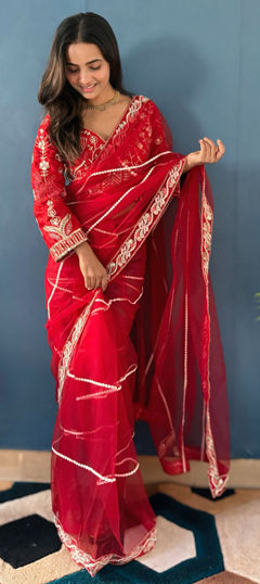 Red and Maroon color Saree in Net fabric with Sequence work