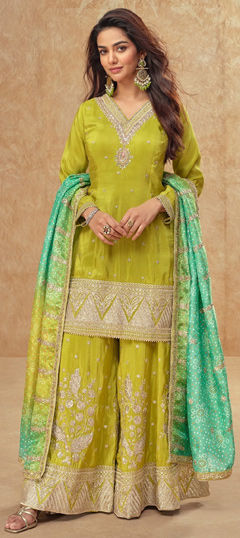 Green color Salwar Kameez in Silk fabric with Embroidered work