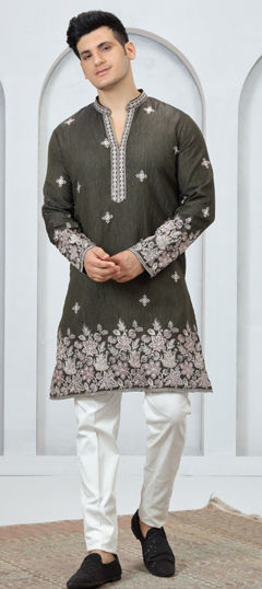 Green color Kurta Pyjamas in Art Silk fabric with Embroidered work