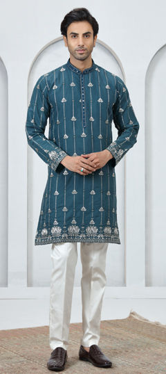 Green color Kurta Pyjamas in Art Silk fabric with Embroidered work