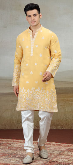 Yellow color Kurta Pyjamas in Art Silk fabric with Embroidered work