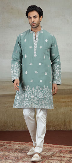 Blue color Kurta Pyjamas in Art Silk fabric with Embroidered work