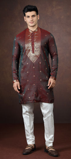 Green color Kurta Pyjamas in Jacquard fabric with Weaving work