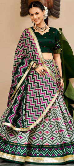 Green color Lehenga in Tussar Silk fabric with Foil Print work