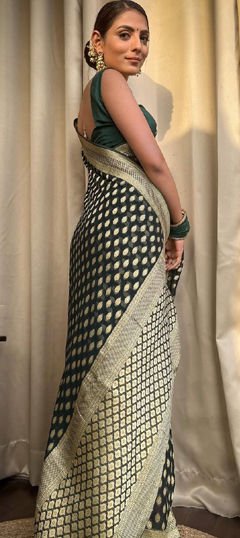 Green color Saree in Banarasi Silk fabric with Weaving work