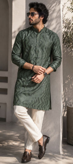 Green color Kurta Pyjamas in Cotton fabric with Embroidered work