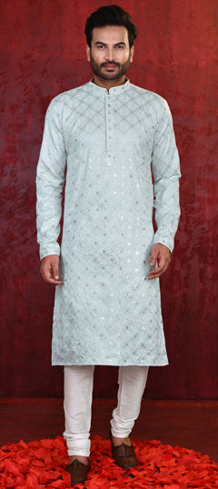 Blue color Kurta Pyjamas in Rayon fabric with Embroidered work